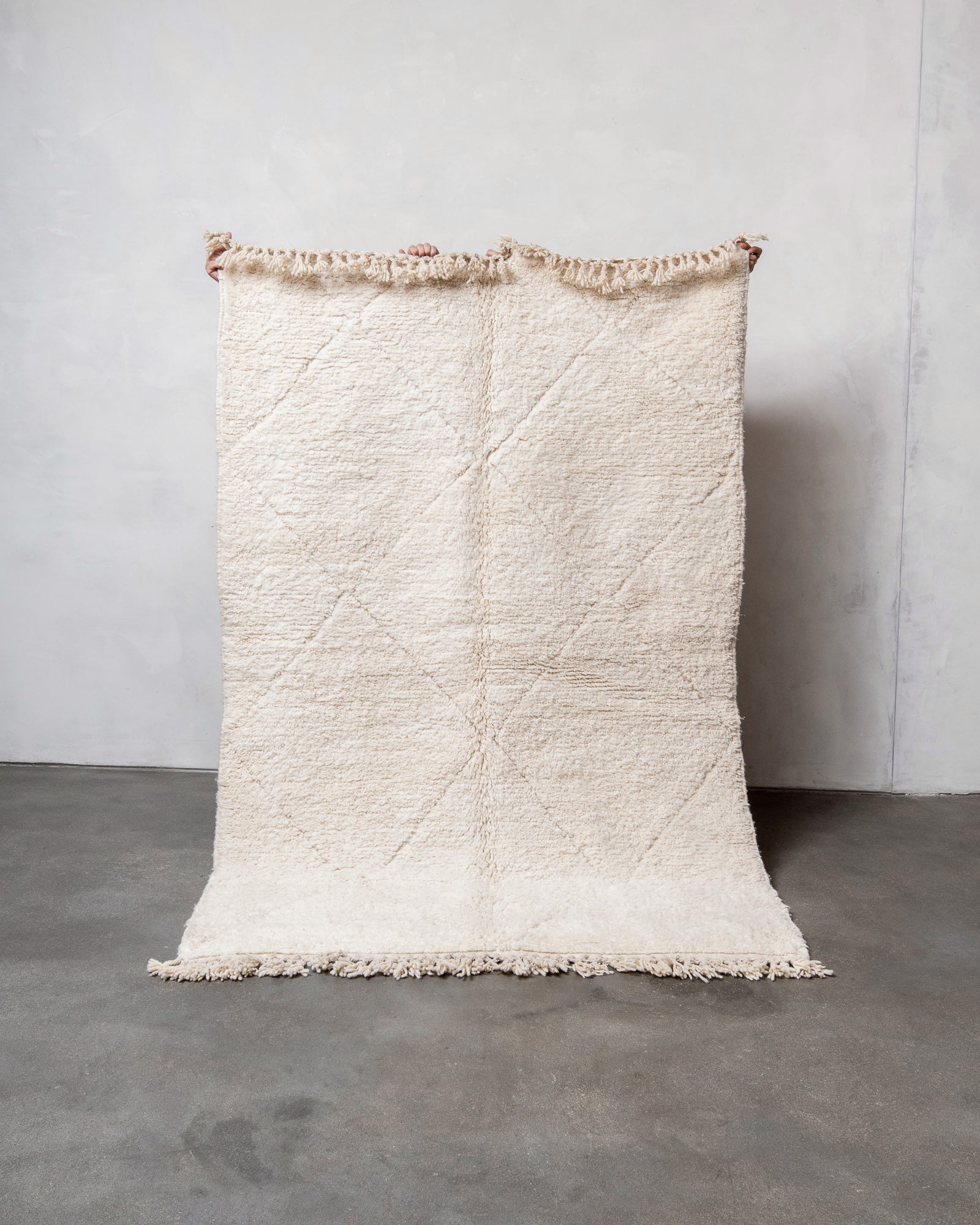 Modern, designer, handcrafted Berber rug from Morocco. Beniourain carpet with beautiful colours and patterns and fluffy wool texture.